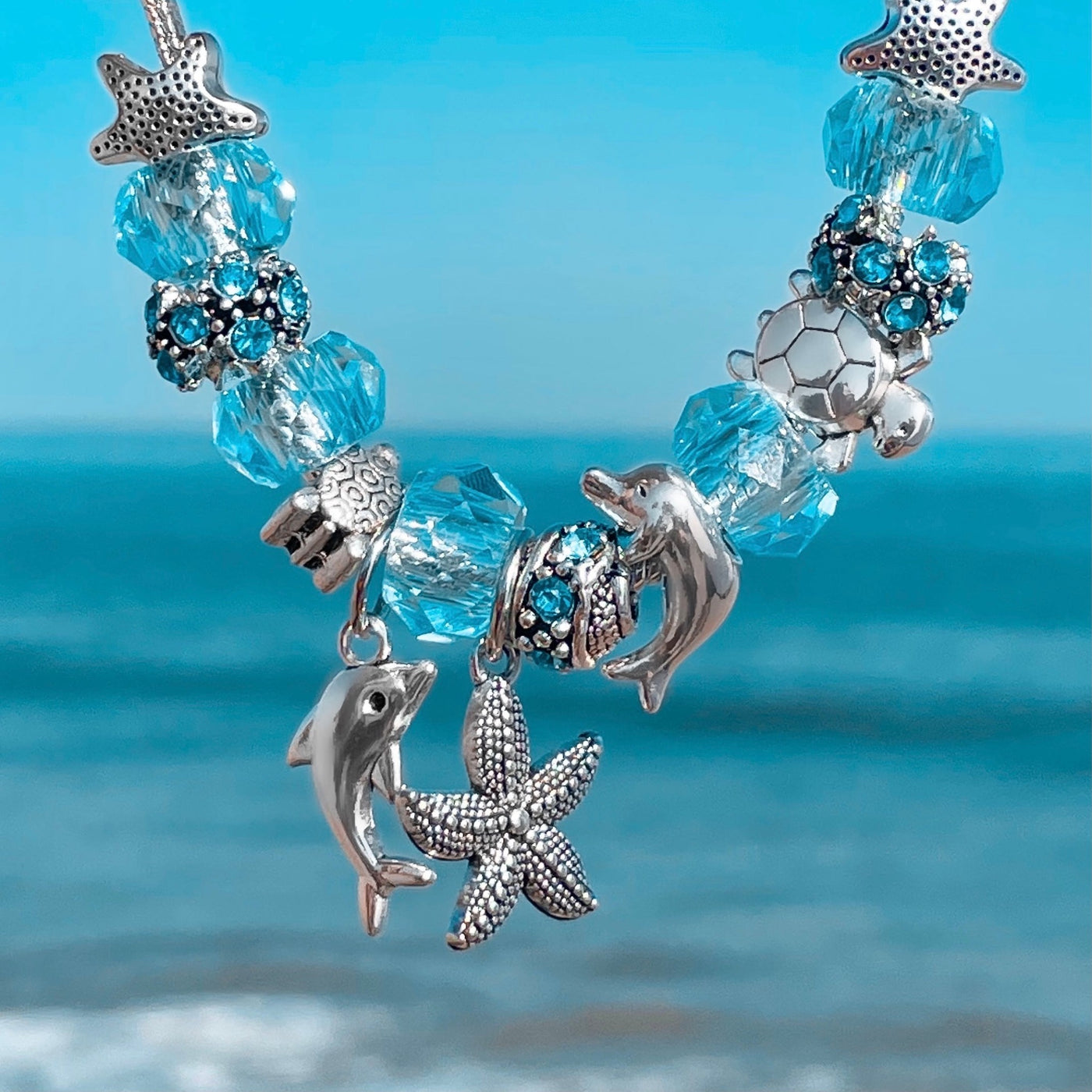 Dolphin and Starfish Charm Bracelet