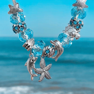 Dolphin and Starfish Charm Bracelet